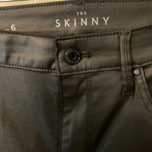 Black faux leather pants.